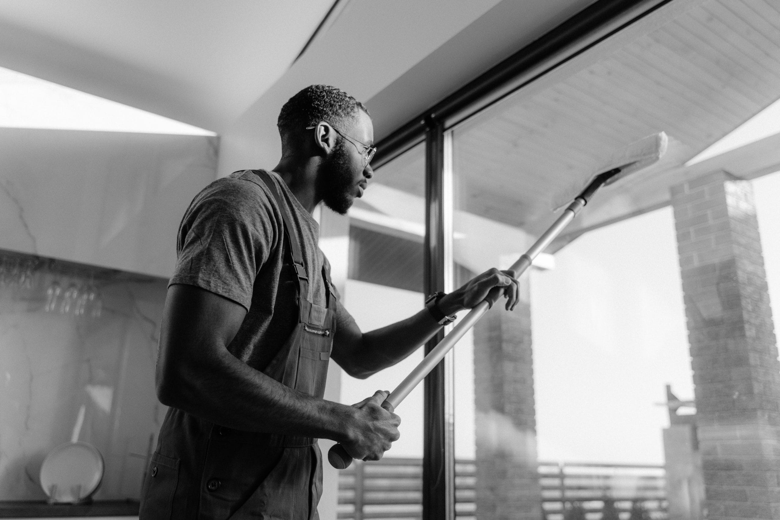 Person cleaning window